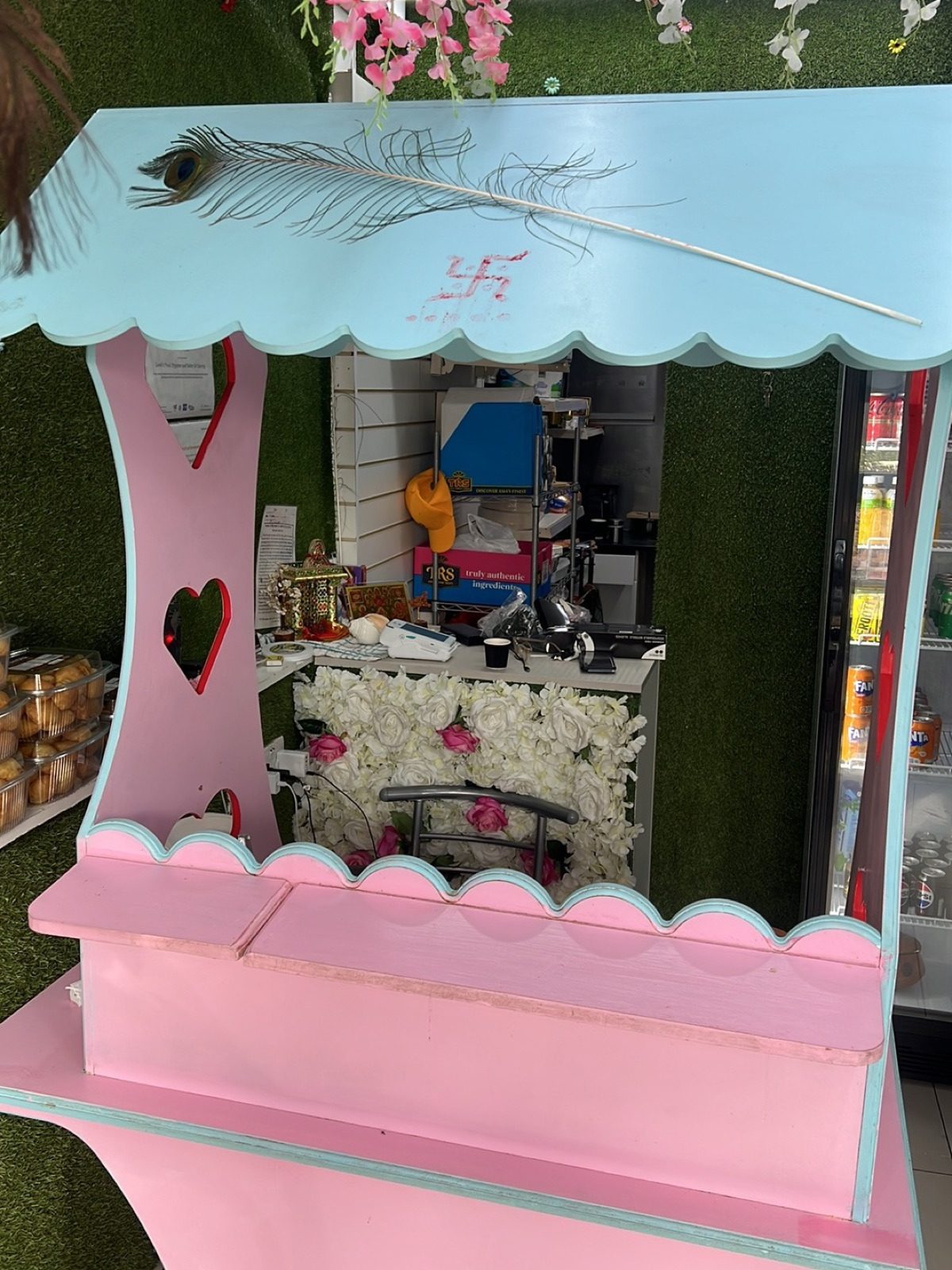 The hand-painted pink and blue stall at the counter inside PANIPURIWALA